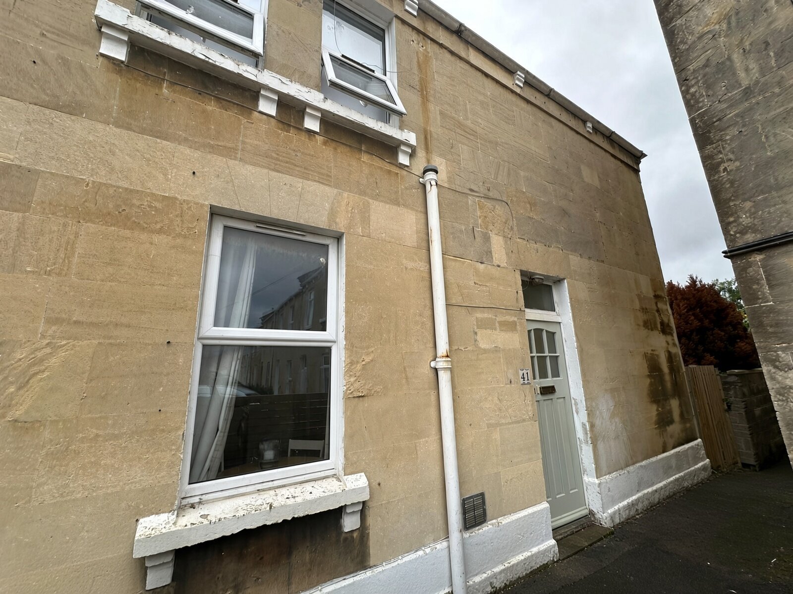 Front of 41 Lorne Road in Bath stone with sash window and front door